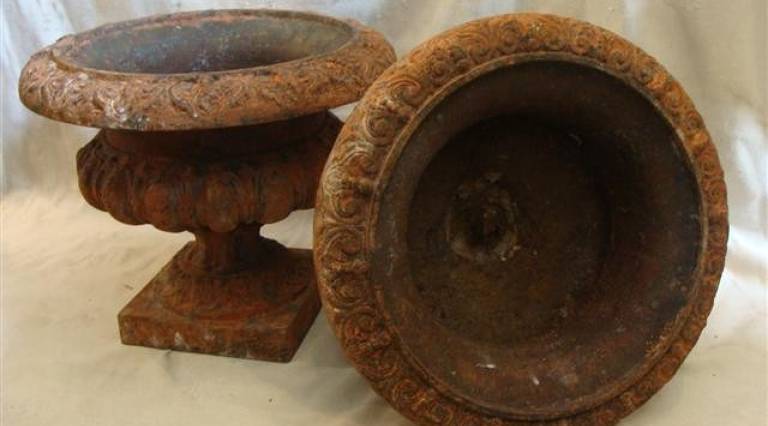 Pair of iron urns