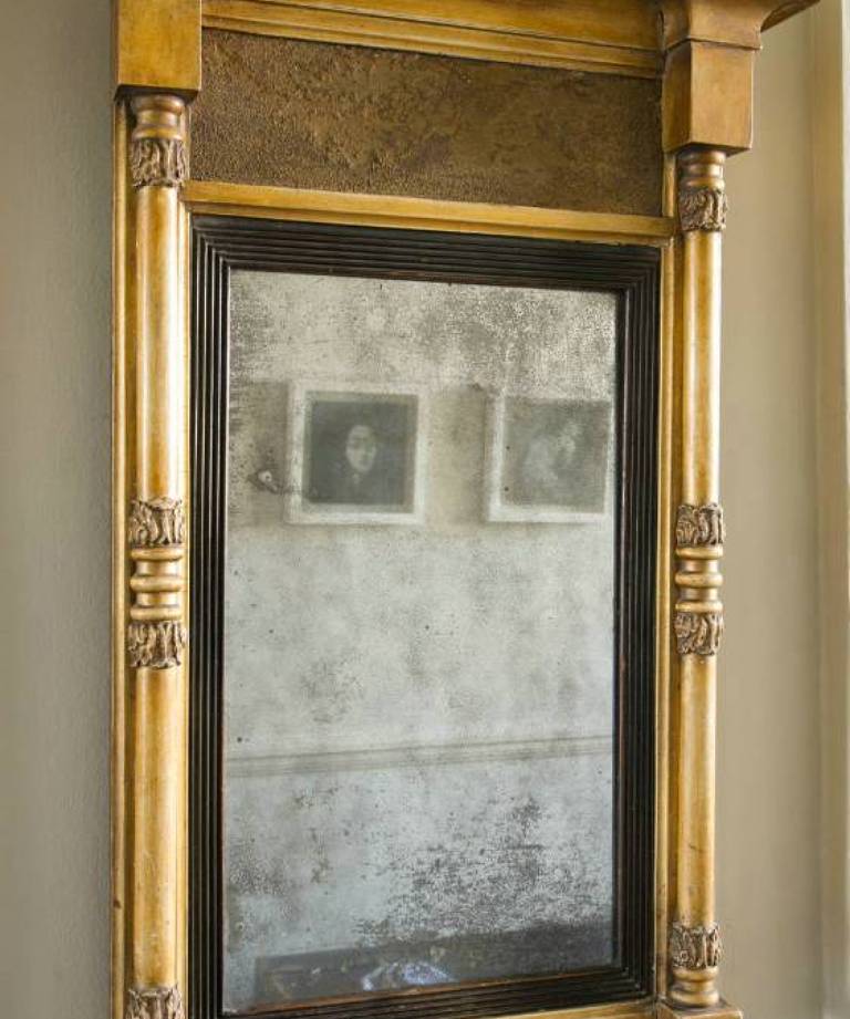 Gilt architectural mirror