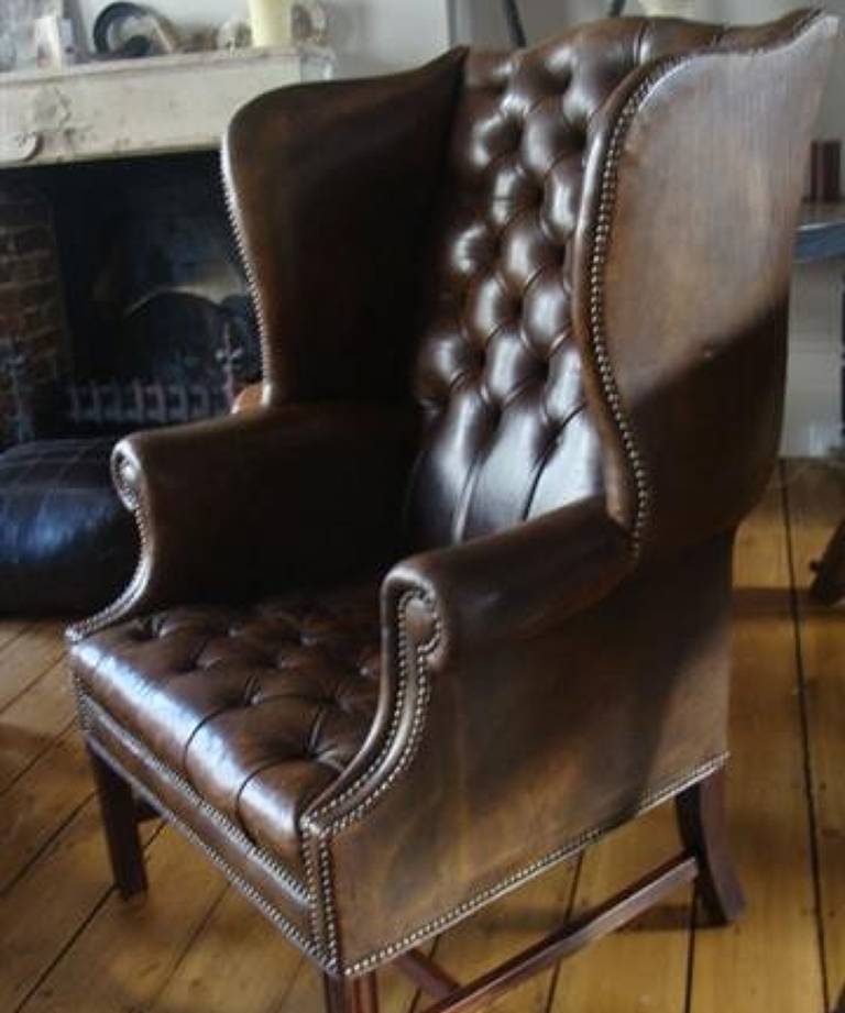Deep buttoned armchair