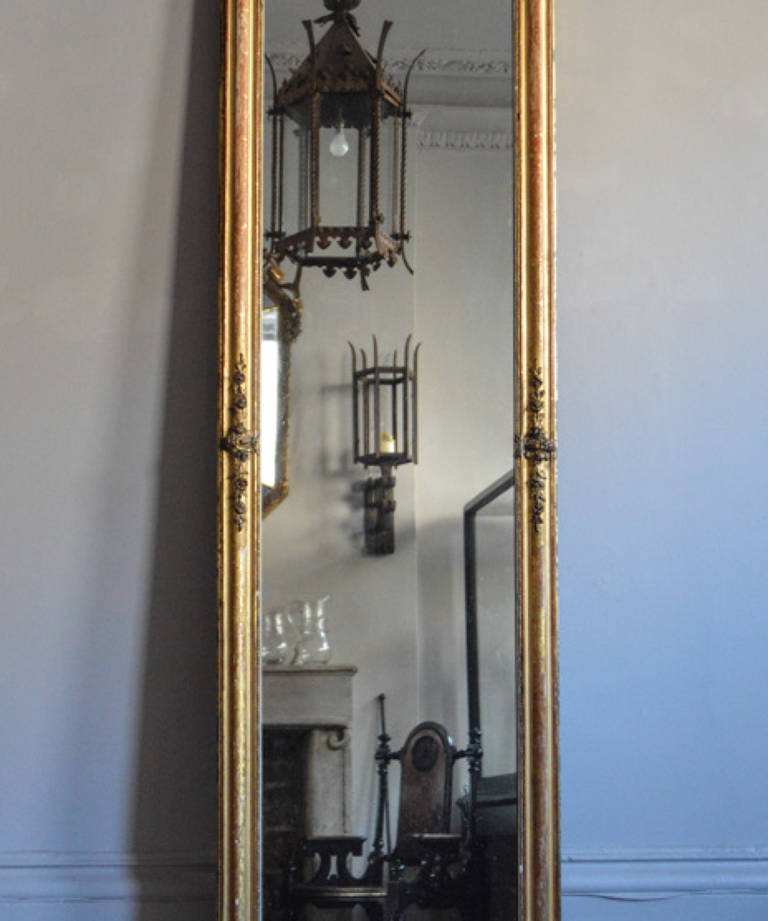 Tall gilt mirror