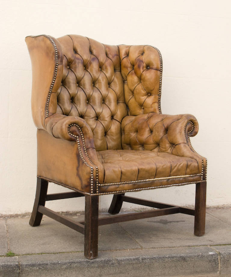 Buttoned wing chair